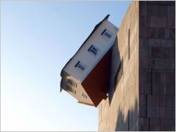 MAISON SUR LE TOIT