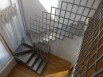 Avant/après : un escalier en acier pour redynamiser un salon