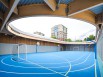 Le complexe sportif : un bâtiment-paysage tout en courbes et contre-courbes