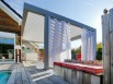 Une pergola sur-mesure magnifie une maison de montagne