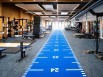 Une salle de musculation intégrant une piste de course