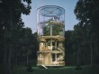 Un arbre au coeur d'une maison de verre