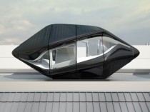 Une chambre-capsule sur le toit d'un hôtel ...