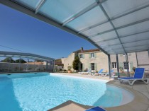 La pose d'un abri téléscopique sur une piscine ...