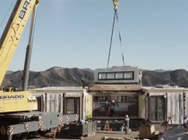 Une maison bois préfabriquée à déplier sur le ...