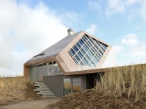 Une maison construite comme une dune