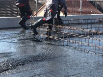 Avec son béton noir, Vicat poursuit son chemin ...