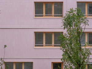 Rose, vert ou bleu' Les façades du village des athlètes se parent de couleurs gaies