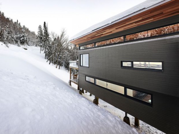 Chalet contemporain sur pilotis entre la forêt et les lacs