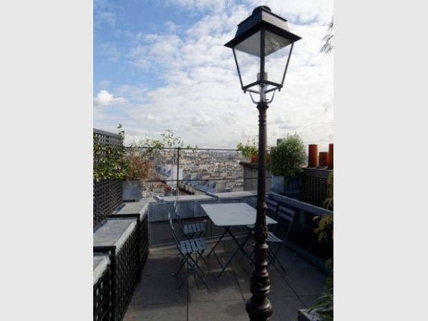 Une toiture terrasse avec vue sur Paris