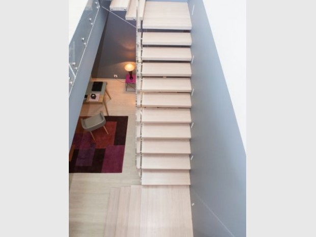 Les paliers brisent la linéarité de l'escalier